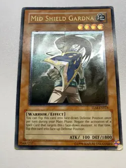 Yu-Gi-Oh! Mid Shield Gardna Ultimate Rare Unlimited TLM-EN024 HP DAMAGED - Image 1