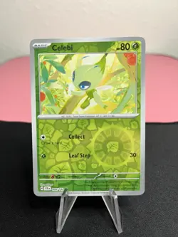 Celebi 004/142 Pokemon Sv07: Stellar Crown Reverse Holo Uncommon Trading Card - Image 1