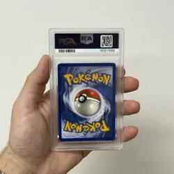 1999 Pokemon Fossil Dragonite #4 Holo PSA 7 - Image 4