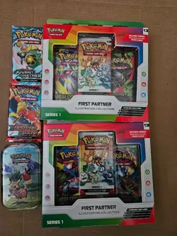 Pokemon Lot All 5 Items 2 boost packs Mini tin and 2 First Partner Illustration - Image 1