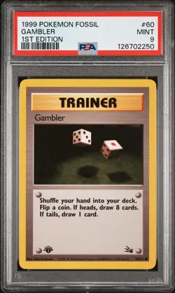 1999 POKEMON FOSSIL 1ST ED #60 GAMBLER PSA 9 - Image 1