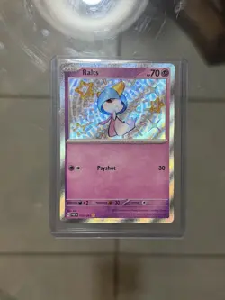 Ralts 153/091 SV: Paldean Fates Shiny Rare Holo English 70 HP Basic - Image 1