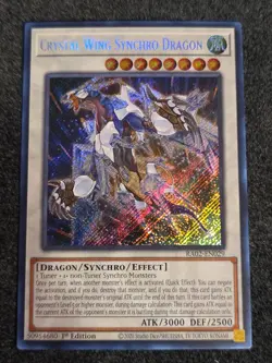 Yugioh! - Crystal Wing Synchro Dragon RA02-EN029 -Secret Ra - 25'TH ANN. - NM/M - Image 1