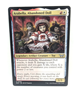 Arabella, Abandoned Doll - Duskmourn - Legendary Artifact Creature - DSK 208 - Image 1