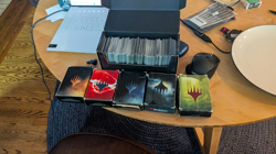 Magic: The Gathering Mixed Card Lot w/ Storage Box & Deck Boxes - Image 1