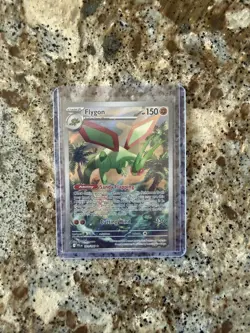 Flygon 101/094 Me02: Phantasmal Flames Holo Pokemon - Image 1