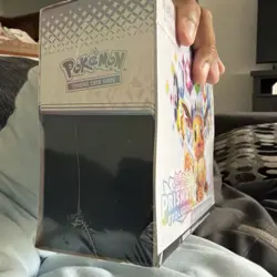 Pokemon TCG Scarlet & Violet Prismatic Evolutions Etb has small tear - Image 1