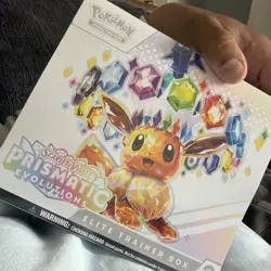Pokemon TCG Scarlet & Violet Prismatic Evolutions Etb has small tear - Image 4