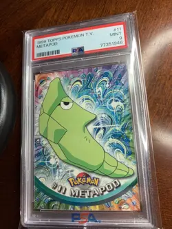 1999 Topps Pokemon TV #11 Metapod Black Logo PSA 9 Mint - Image 1