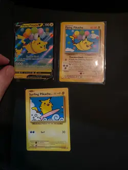 Pokemon Flying Pikachu & Surfing Pikachu Celebrations 3-Card Lot 2021 NM/MP - Image 1