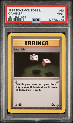 1999 POKEMON FOSSIL 1ST ED #60 GAMBLER PSA 9 - Image 1