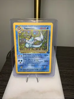 1999 POKEMON VAPOREON 1ST EDITION JUNGLE 12/64 HOLO RARE NM - Image 1