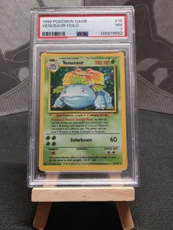 1999 POKEMON BASE SET UNLIMITED #15 VENUSAUR-HOLO PSA 7 - Image 1