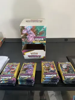 (51) Pokemon Sealed Unified Minds 3 Card Booster Packs and Box - Image 1