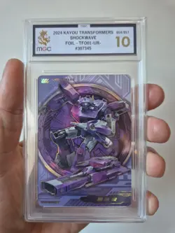 Shockwave Kayou Transformers One Card Foil G1 Grade MGC 10 - Image 1