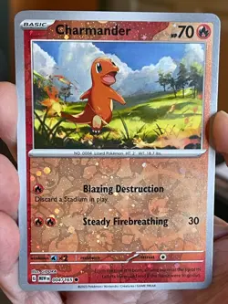 POKEMON CHARMANDER 004/165 COMMON COSMOS REVERSE SCARLET & VIOLET MEW - Image 1