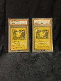 TWO 1999 POKEMON JUNGLE 1ST EDITION PIKACHU PSA 8 RED CHEEKS #60/64 - Image 1