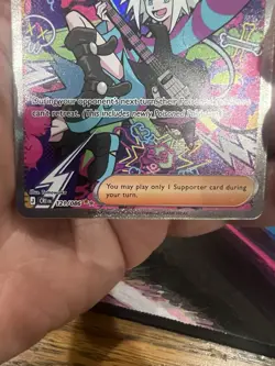 Pokemon Roxie's Performance 121/086 Me04: Chaos Rising Holo - Image 4