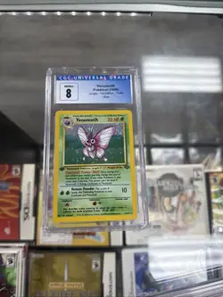 ⚡❄ 1999 Pokemon 1st Edition Jungle Venomth #13 CGC Graded 8 - Image 1