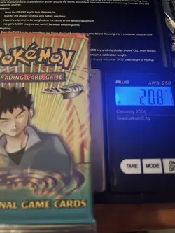 Pokemon Gym Heroes Unlimited Booster Pack Sealed 20.8g - Image 1