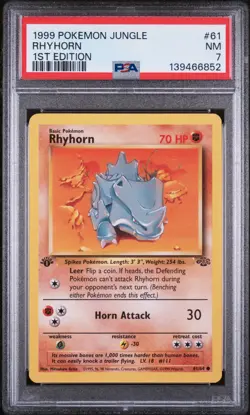 PSA Card NEAR MINT 7 1999 POKEMON JUNGLE 61 RHYHORN 1ST EDITION - Image 1