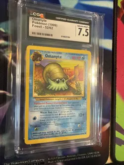Pokemon TCG (1999) Omanyte 52/62 Fossil 1st Edition CGC 7.5 - Image 2