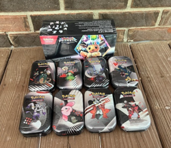 BRAND NEW-Pokemon TCG Prismatic Surprise Box & Black Bolt White Flare Mini Tins - Image 1