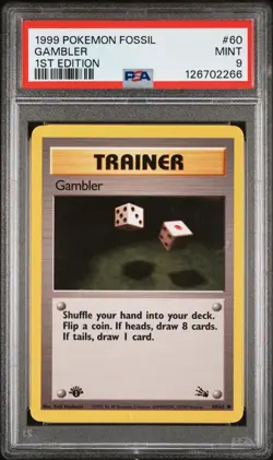 1999 POKEMON FOSSIL 1ST ED #60 GAMBLER PSA 9 - Image 1