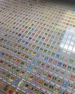 🔥One Random PSA 9 Graded Pokemon with 100 common/uncommon Pokemon cards + extra - Image 1