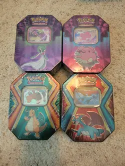 4 Pokemon Tins Contains 10 - 3 card Mini Packs A Tin - Image 1