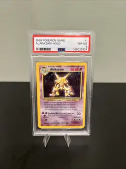 Pokemon 1999 Base Set Alakazam Holo PSA 8 1/102 Wizards of the Coast - Image 1
