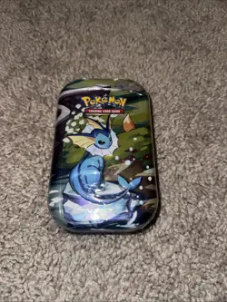 Pokemon Scarlet & Violet Prismatic Evolution Vaporeon Mini Tin *Factory Sealed* - Image 1