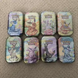 Pokemon TCG Prismatic Evolutions Mini Tins-Full Set-8 Tins-32 Packs - Image 1