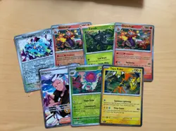 Bulk Lot of S & V 08: Surging Sparks Pokemon Cards (7 Holos/Reverse Holos) - Image 1
