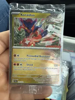 Pokemon TEF EN GameStop Stamped Promo HOLO Koraidon #119/162 - Factory Sealed - Image 1