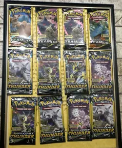 Pokemon TCG 12 Booster Pack Lot, 3-Card Packs, Team Up & Lost Thunder (EN) - Image 1