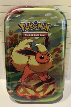 Pokemon Prismatic Evolutions SV8.5 Flareon Mini Tin Factory Sealed 🌟✨🌙💫 - Image 1