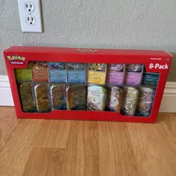 Unopened Pokemon Prismatic Evolutions 8 Mini-Tins with Promo Cards - Image 1