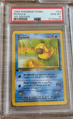 1999 POKEMON FOSSIL 1ST EDITION #53 PSYDUCK PSA 10 - Image 1
