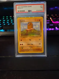 1999 POKEMON GAME DIGLETT #47 POKEMON PSA 7 - Image 1