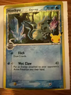 Mimikyu Delta Species SWSH136 Celebrations Black Star Promo Pokemon Card. - Image 1