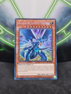 Yugioh Blue-Eyes Shining Dragon LCKC-EN008 Secret Rare 1st Edition NM - Image 1