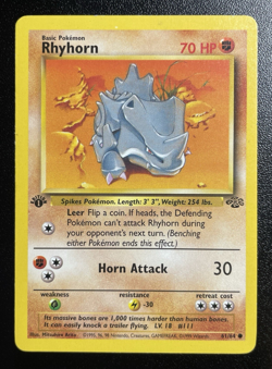 Rhyhorn 61/64 1st Edition Jungle Pokemon Card LP - Image 1