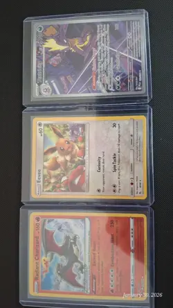 Pokemon TCG Cards NM Radiant Charizard 020/159, Evee 46/68, Toxtricity 103/094 - Image 1