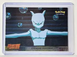 1999 Topps Pokemon #27 Stealing Pokemon Holo/Foil - Mewtwo Strikes Back - Image 1