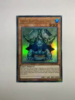 YuGiOh Crystal Beast Emerald Tortoise BLCR-EN049 Ultra Rare 1st Edition - Image 1
