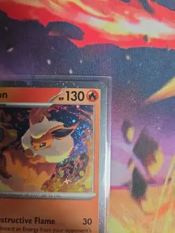 Pokemon - Prismatic Evolutions Cosmos Holo Flareon 013/131 NM SWIRL - Image 3