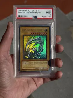 Blue-Eyes White Dragon SDK-001 Starter Deck Kaiba Edition PSA 9 With Holo Bleed - Image 1
