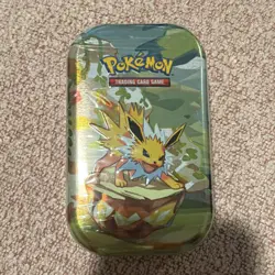 Pokemon TCG Scarlet & Violet Prismatic Evolutions Mini Tin Jolteon - SEALED - Image 1