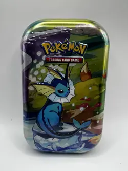 Pokemon Scarlet & Violet Prismatic Evolution Vaporeon Mini Tin *Factory Sealed* - Image 1